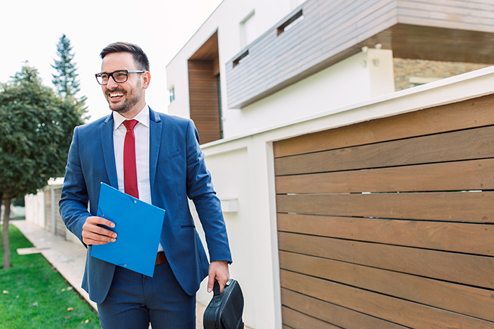 Man in business suit smiling