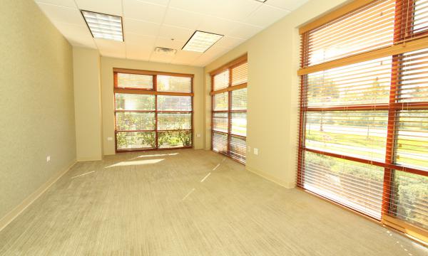 Move-in ready office in highly visible end cap unit