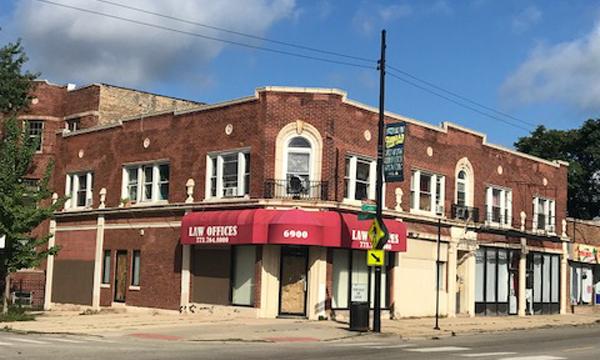 Mixed-use building for sale on Clark St in Chicago's Rogers Park neighborhood
