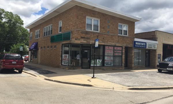 Auction 5/17: Retail/Apartment Building With Upside Potential